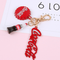 韩国新品可爱卡通可乐瓶钥匙扣圈创意airpods2耳机套包包挂件饰女